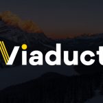 Cover image of mountains with the Viaduct logo in the center